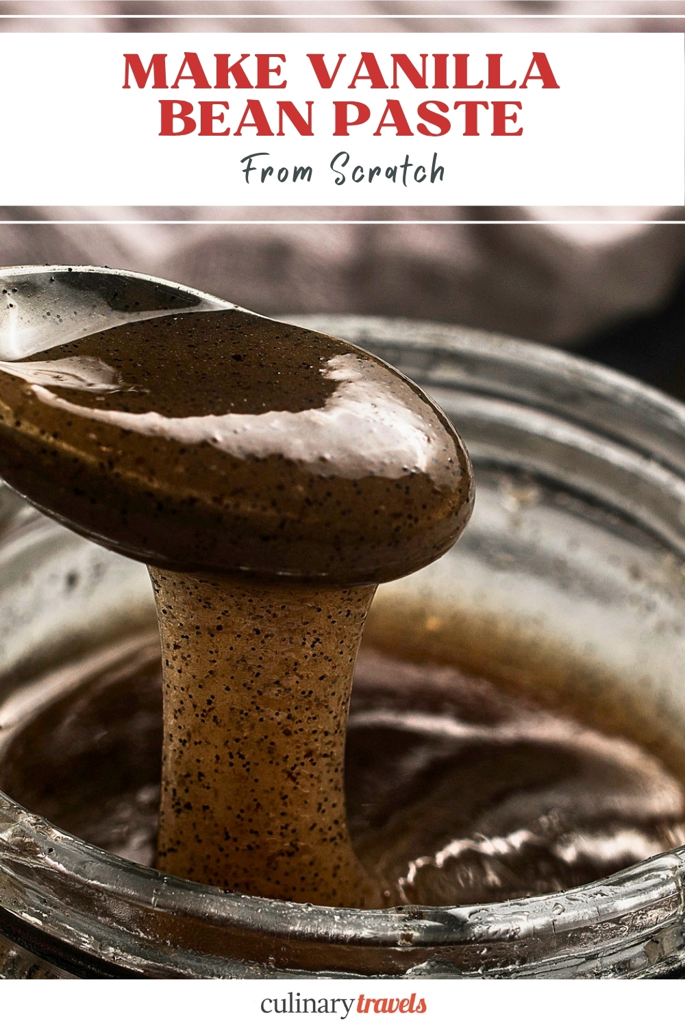 Close-up Pinterest graphic of thick homemade vanilla bean paste on a spoon with the text Make Vanilla Bean Paste From Scratch